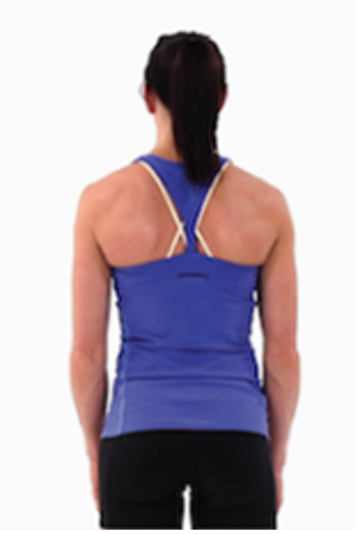 The back of a person with a dark brown ponytail and blue tank top is shown. The person is standing with their arms to their sides.
